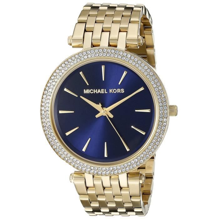 montre michael kors dore fond bleu