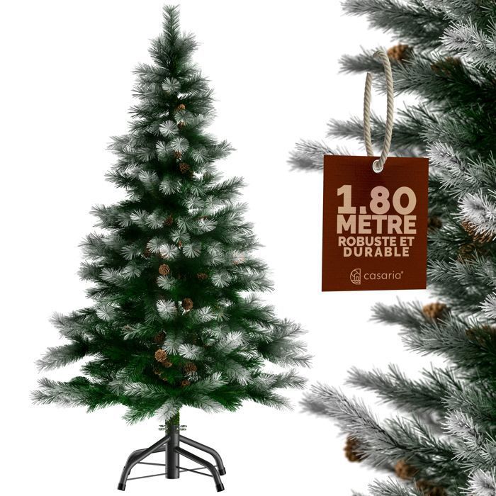 Sapin de Noël pommes de pins et neige artificielle