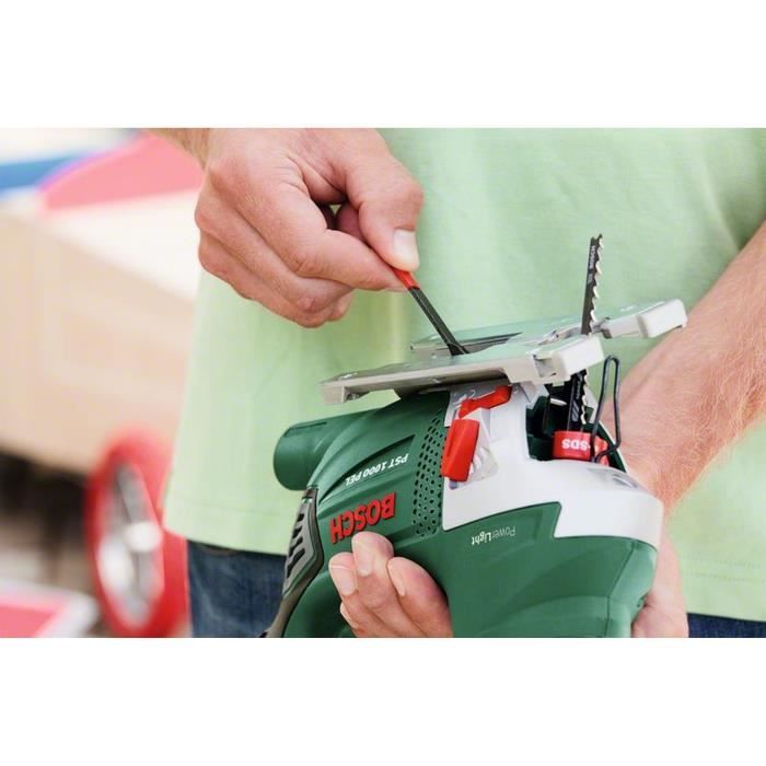 BOSCH Scie sauteuse PST 1000 PEL (650 W avec 6 lames de scies, 1 adaptateur anti-adhésif, 1 butée parallele, capot de protection)