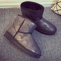 BOTTINE bottes noires à motif sombre de longueur courte po BOTTINE bottes noires à motif sombre de longueur courte po