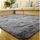 Tapis poil long gris