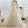 La nouvelle robe de mariage de dentelle de traîne